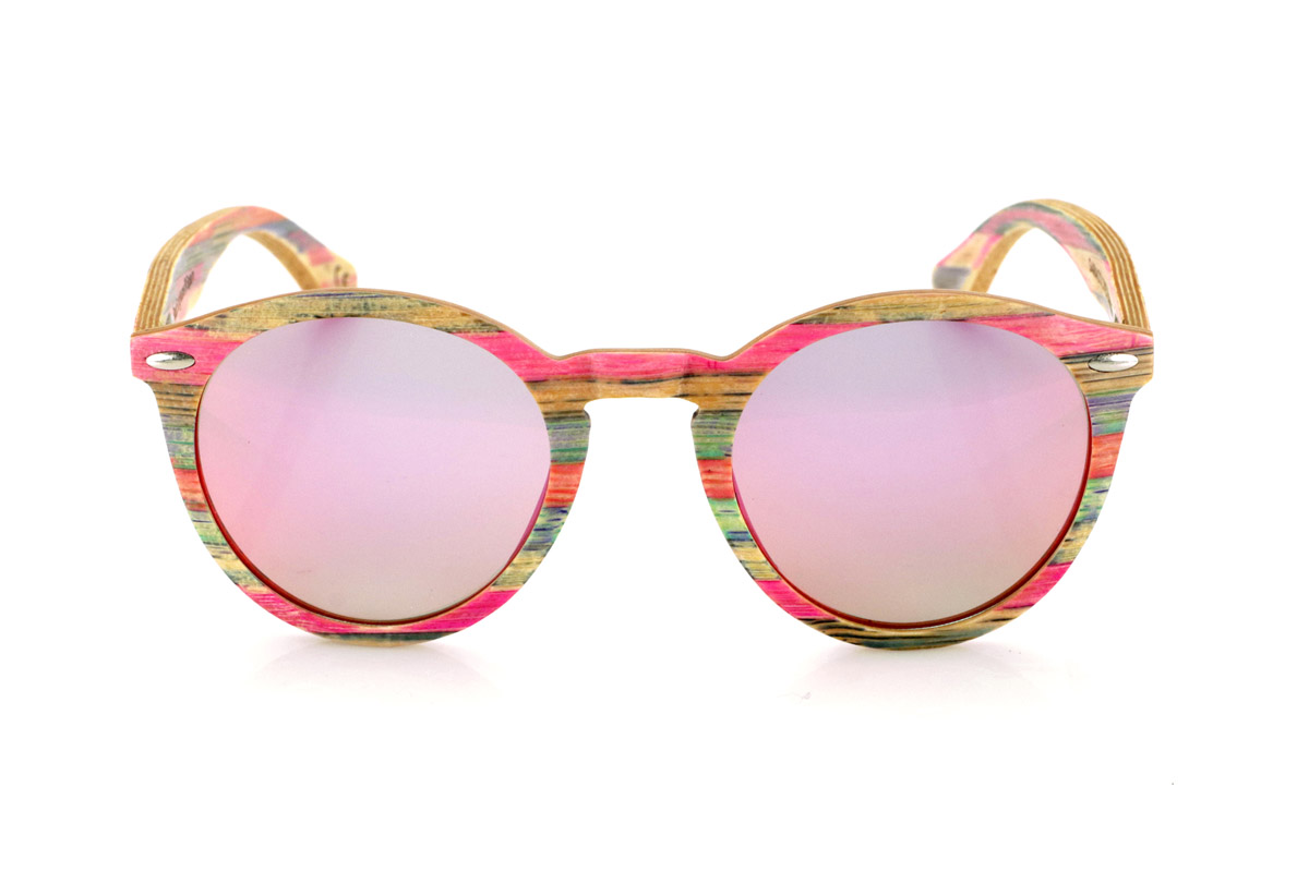 Wood eyewear of Bamboo SARA. SARA wooden sunglasses are made from multicoloured laminated bamboo, highlighting a unique combination of vibrant shades. Their rounded frame provides a timeless style with a distinctive touch, while the metallic trim on the front enhances their design. The laminated wood construction ensures strength and comfort for daily use. They incorporate polarised lenses that guarantee total protection against UV rays and reduce glare.

Dimensions: 146x50mm. Caliber 48. for Wholesale & Retail | Root Sunglasses® 